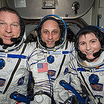 ISS043E174185 (05/06/2015) --- NASA astronaut Terry Virts (left) Commander of Expedition 43 on the International Space Station along with crewmates Russian cosmonaut Anton Shkaplerov (center) and ESA (European Space Agency) astronaut Samantha Cristoforetti on May 6, 2015 perform a checkout of their Russian Soyuz spacesuits in preparation for the journey back to Earth.