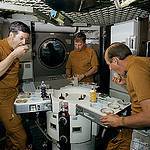 Skylab Crew Members Dine on Specially Prepared Space Food