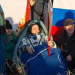 Expedition 37 Commander Fyodor Yurchikhin Holds the Olympic Torch