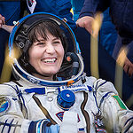 Expedition 43 Italian astronaut Samantha Cristoforetti from European Space Agency (ESA) rests in a chair outside the Soyuz TMA-15M spacecraft just minutes after she and NASA astronaut Terry Virts of NASA, and cosmonaut Anton Shkaplerov of the Russian Fede